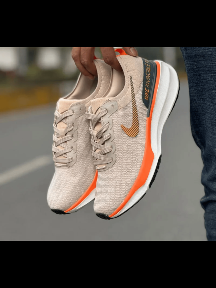 Web-Photo-Editniki-1 ZoomX Invincible Running shoes orange-beige - Image 1