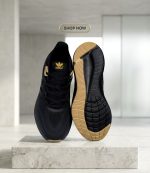 Adidas Pureboost 23 – Black/Metallic Gold - Image 3